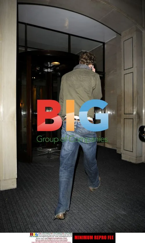 Emma Watson's Mystery Man Arrives at Hotel