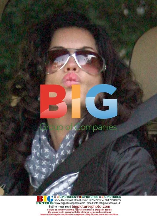 Janice Dickinson leaves hotel with boyfriend