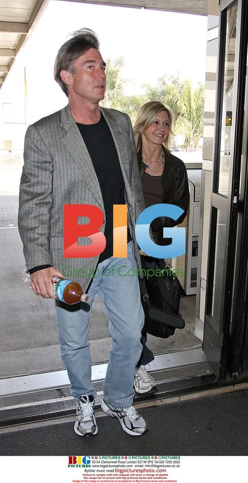 Olivia Newton-John departs LAX