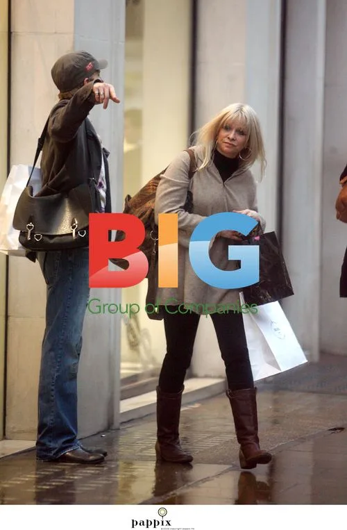 Ronnie Wood and family shopping in London