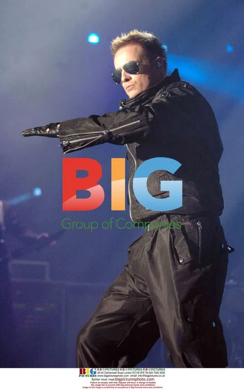 Westlife Performs on Stage in Glasgow