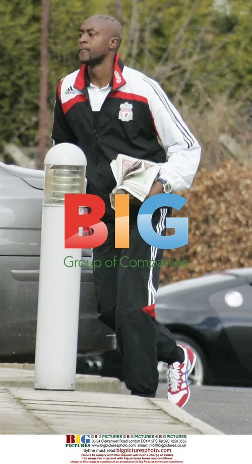 Dirk Kuyt arrives at Melwood in Audi R8