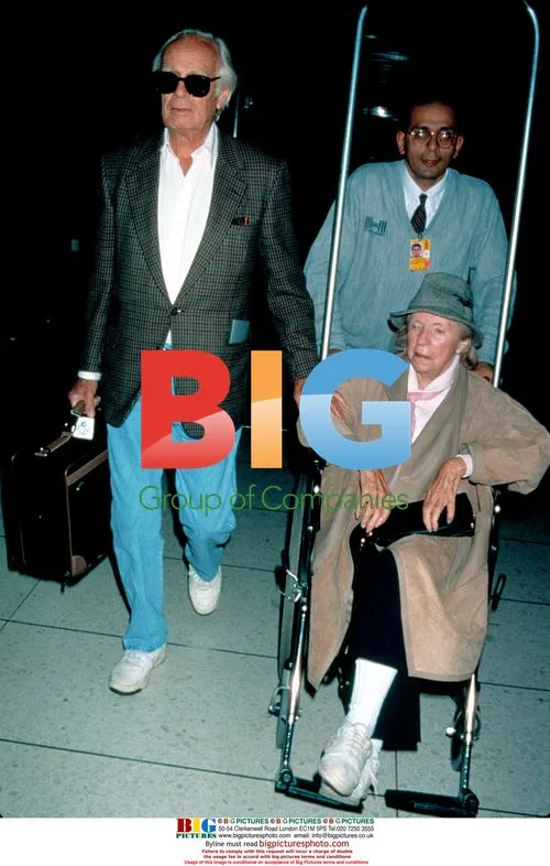 Richard Widmark Departs LAX with Wife