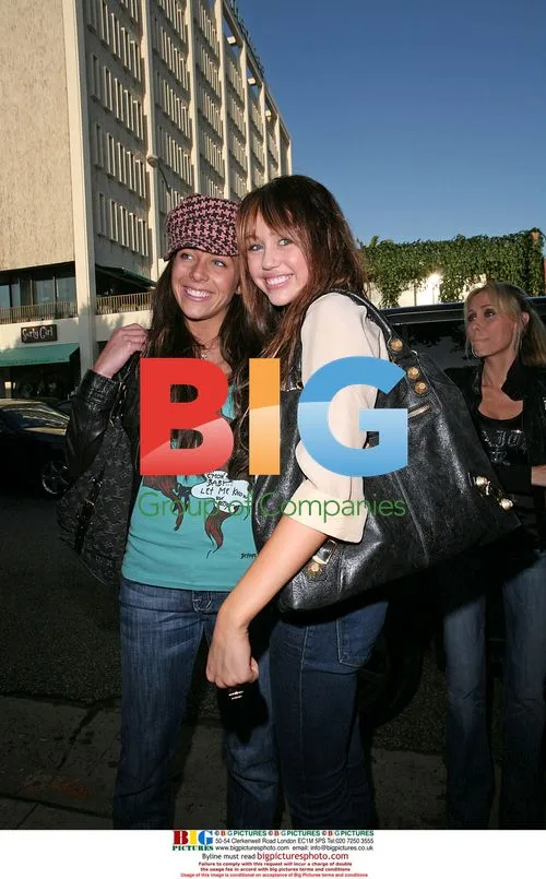 Miley Cyrus celebrates with friends