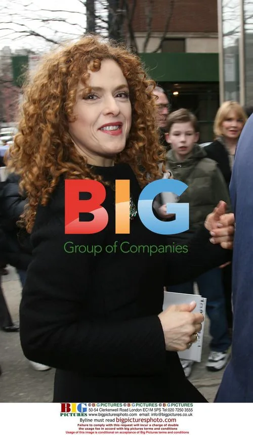 Regis Philbin and Bernadette Peters film auto show segment