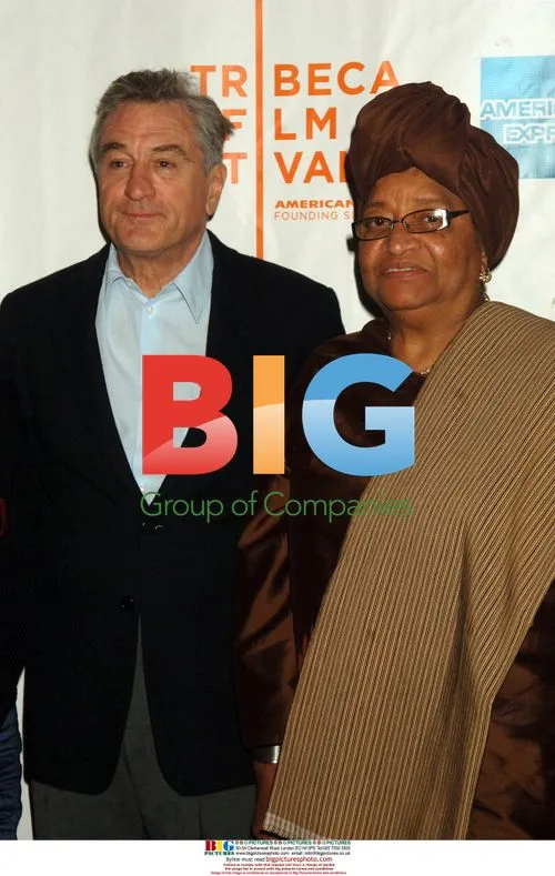 Robert DeNiro escorts Liberian President