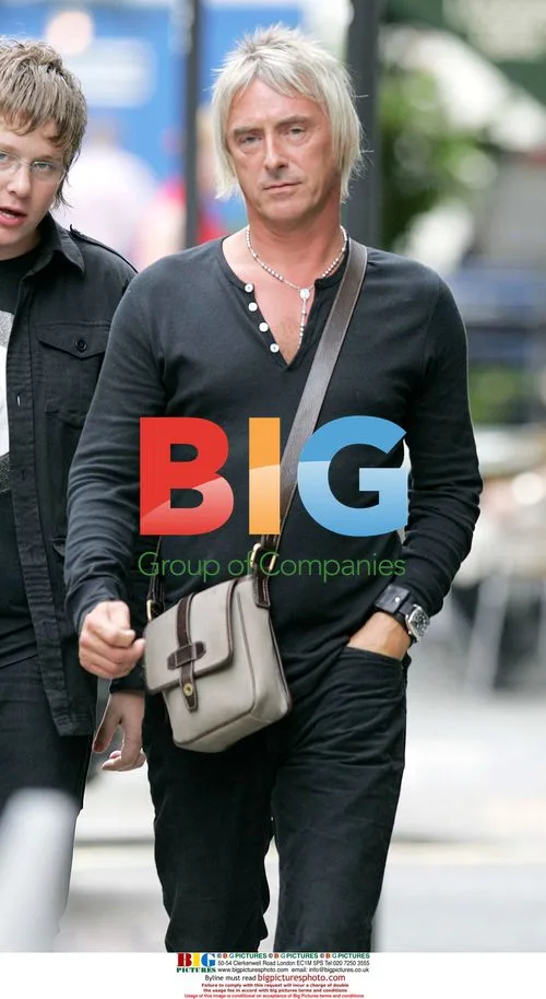 Paul Weller Leaving Cafe