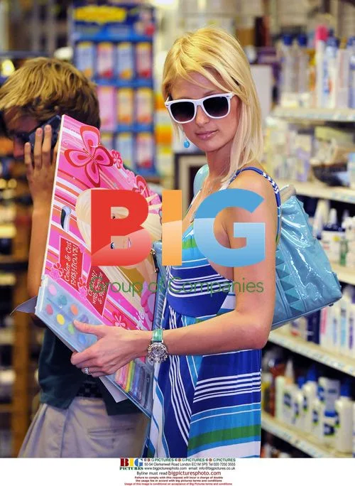Paris Hilton Flashes Engagement Ring