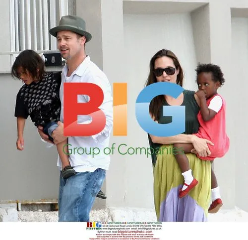 Angelina Jolie and Brad Pitt on Family Beach Walk