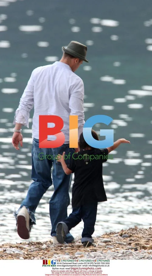 Angelina Jolie and Brad Pitt on Beach with Family