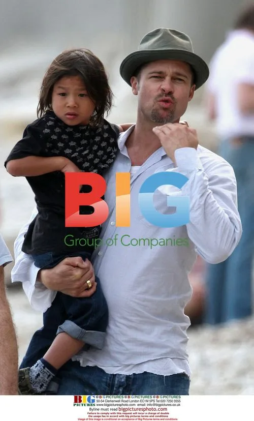 Angelina Jolie and Brad Pitt on Family Beach Walk