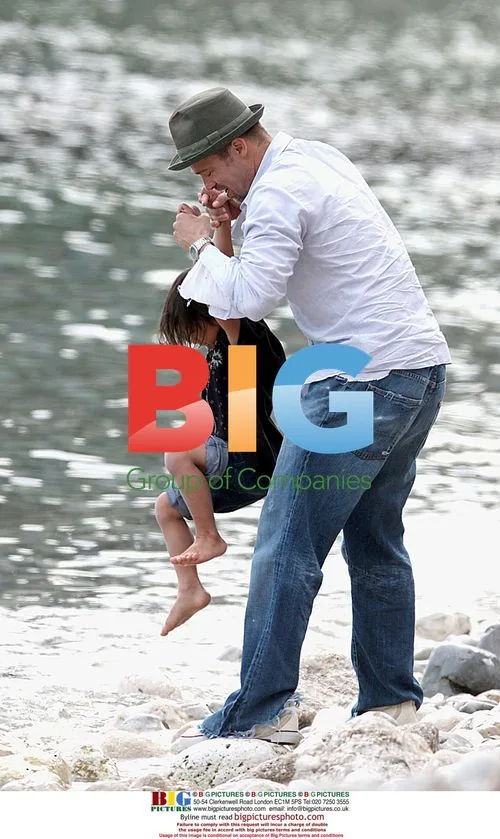 Angelina Jolie and Brad Pitt on Family Beach Walk