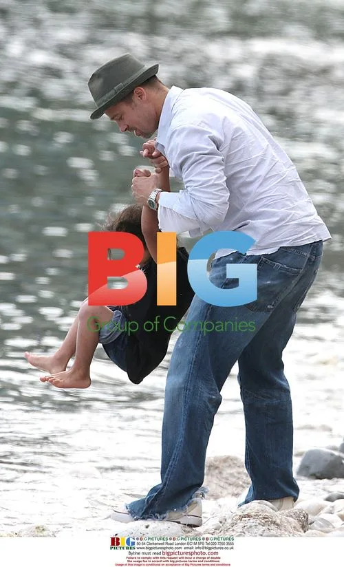Angelina Jolie and Brad Pitt on Family Beach Walk
