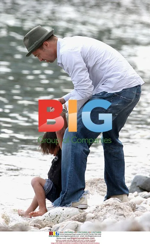 Angelina Jolie and Brad Pitt on Family Beach Walk