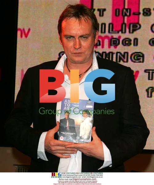 Actor Phil Glenister signs "Ashes To Ashes" DVD