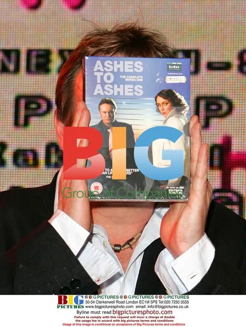 Phil Glenister signs "Ashes To Ashes" DVD