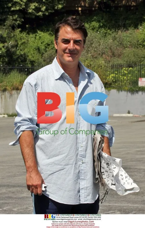 Chris Noth reads newspaper at Peets
