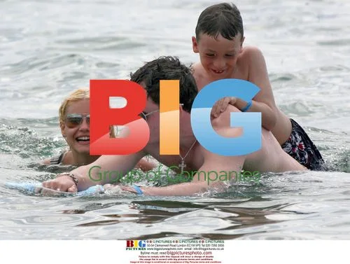 Elisha Cuthbert and Dion Phaneuf at the Beach