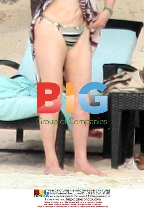 Catherine Deneuve on holiday with family