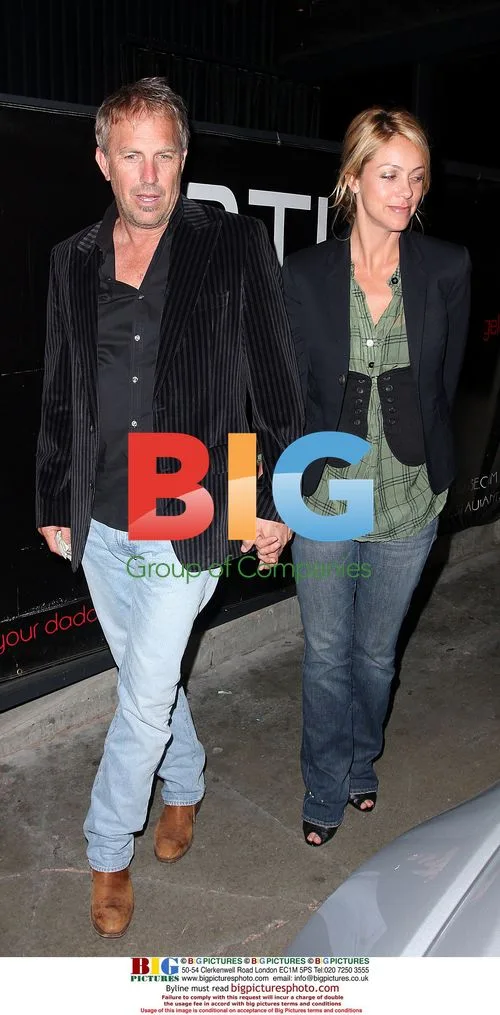 Kevin Costner and Christine Baumgartner leaving restaurant