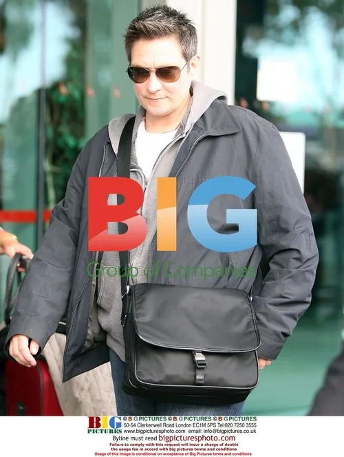 KD Lang arrives at Perth Airport