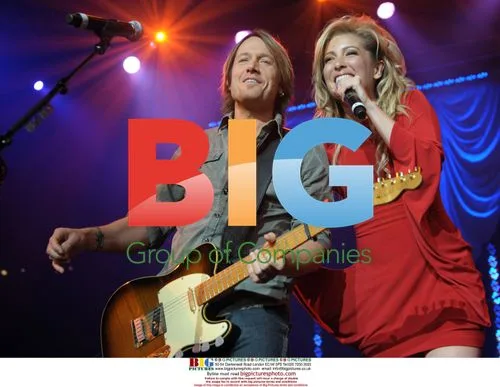 Sarah Buxton and Keith Urban perform at ACM event