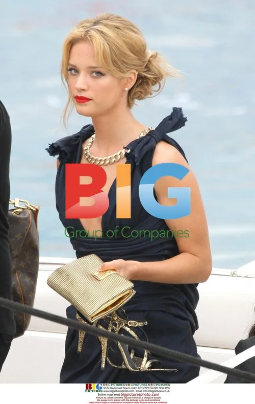 Swiss Model Julie Ordon Arrives by Boat in Cannes