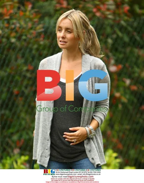 Pregnant Louise Redknapp Walks Dogs