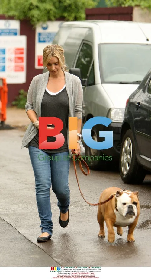 Pregnant Louise Redknapp with dogs