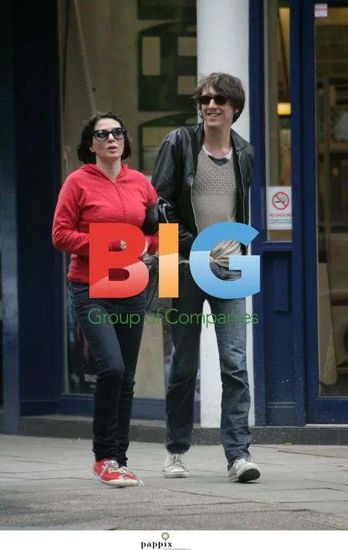 Sadie Frost and Kristian Marr Kissing in London