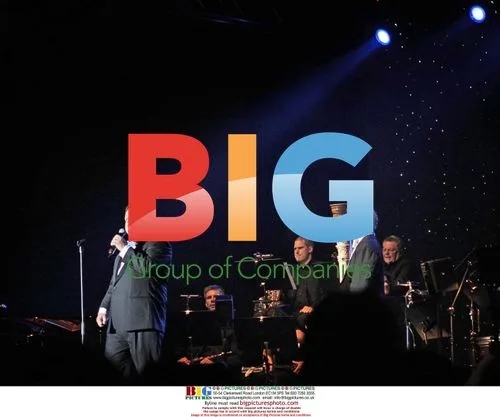 Paul Potts performs on stage in Stockholm