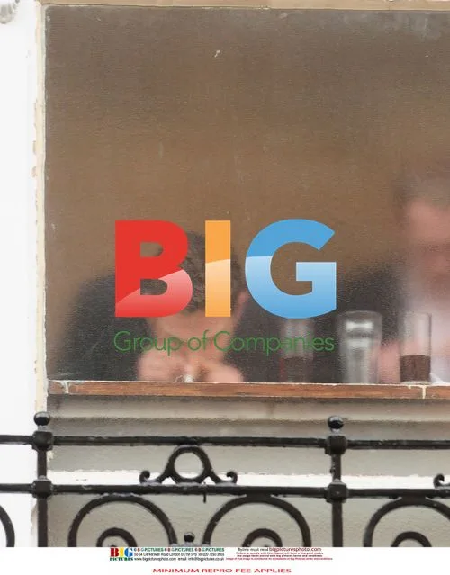 Men Snorting Drugs in Pub Windowsill