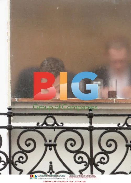 Two Men Appear to Be Taking Drugs