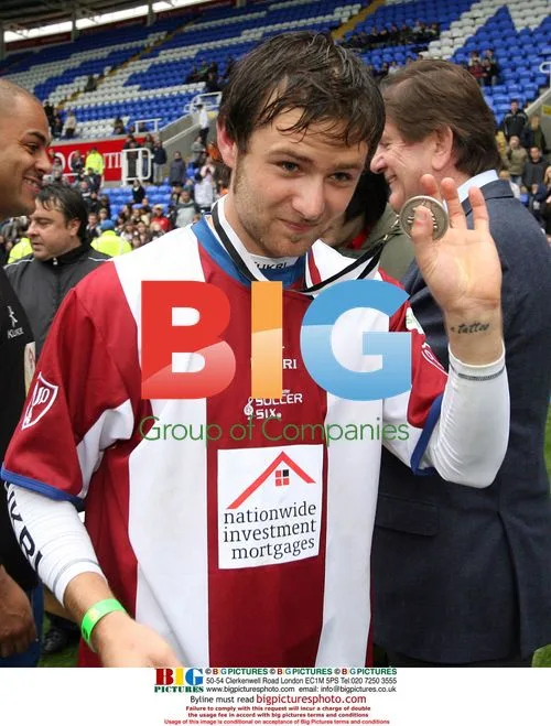 Harry Judd Shows Runners Up Medal