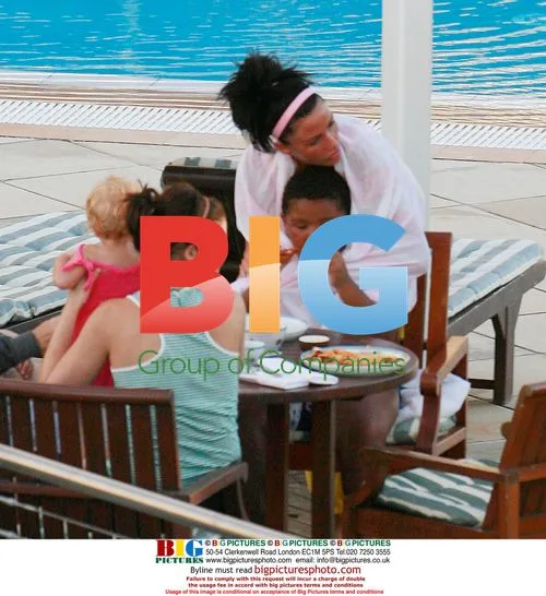Katie Price and Family at Hotel Pool