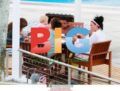 Katie Price and Family at Hotel Pool