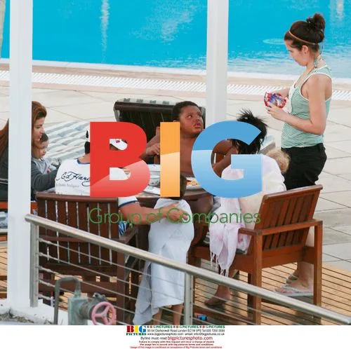 Katie Price with Family at Hotel Pool