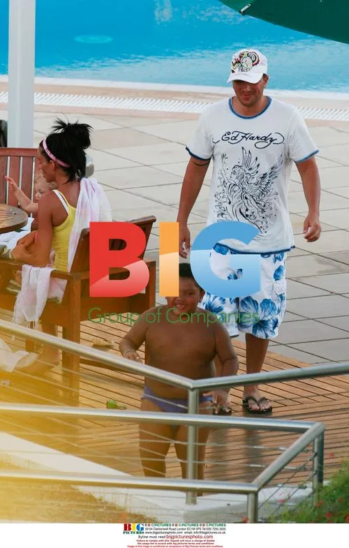 Katie Price and family at hotel pool