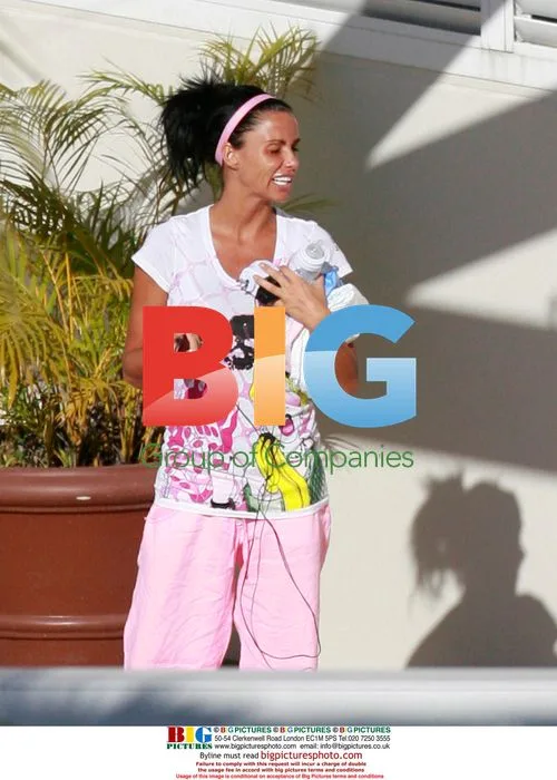 Katie Price with family at hotel pool