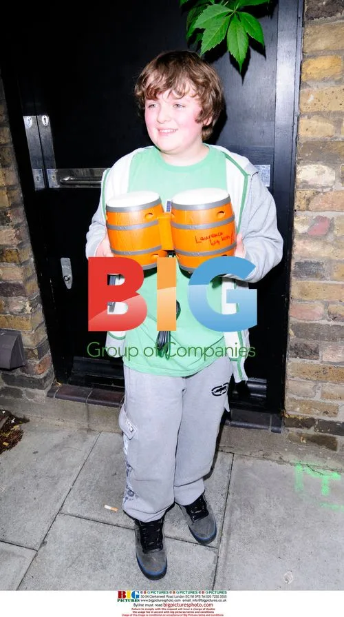 Amy Winehouse autographs boy's bongo drums