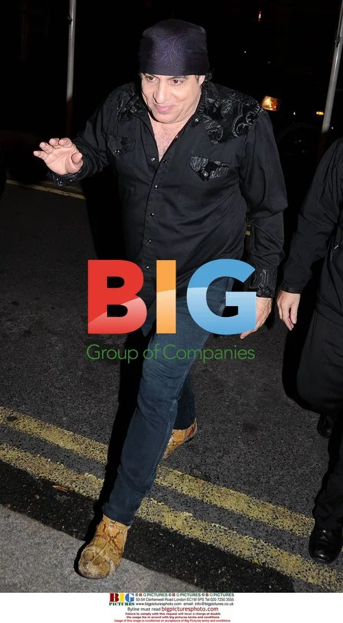 Steven Van Zandt exits hotel after Springsteen concert