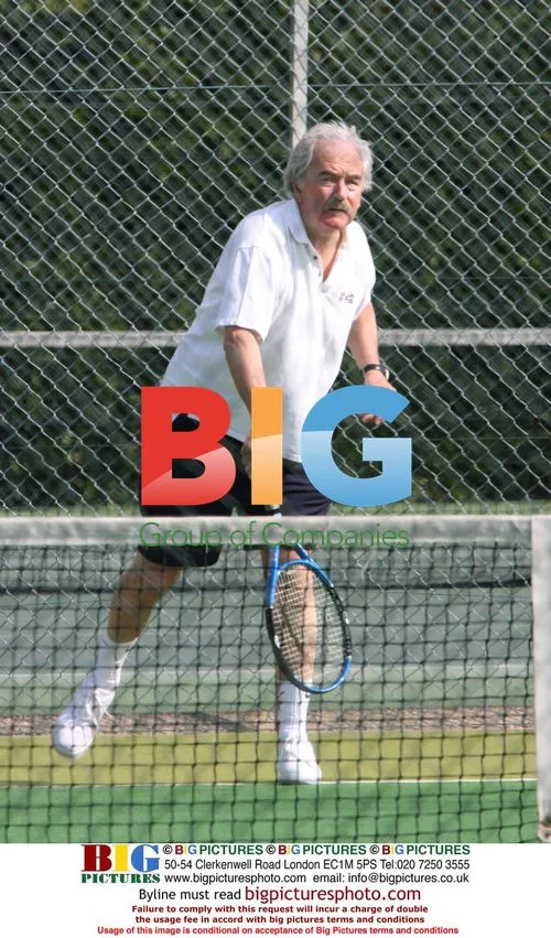Des Lynam Playing Doubles Tennis