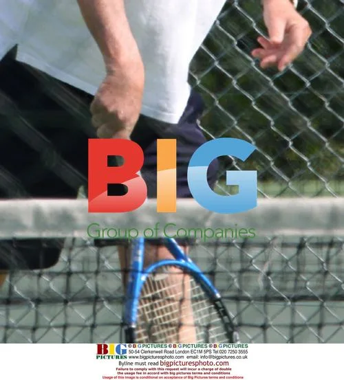 Des Lynam Plays Doubles Tennis