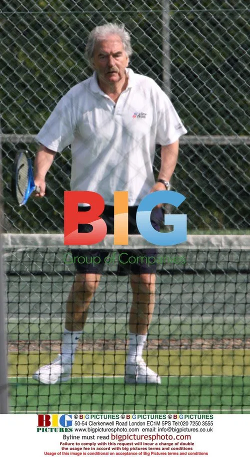 Des Lynam Playing Doubles Tennis