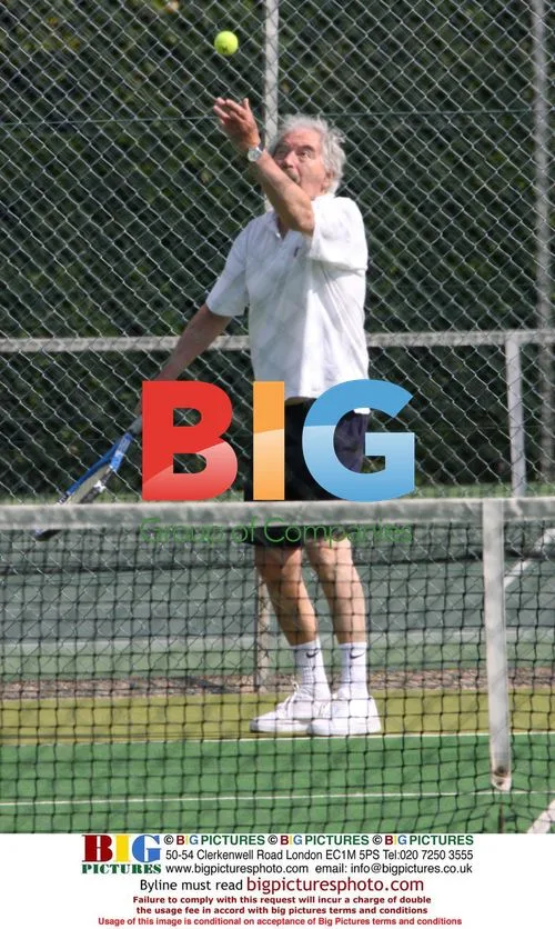 Des Lynam Playing Doubles Tennis