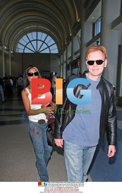 David Caruso and Liza Marquez depart LAX