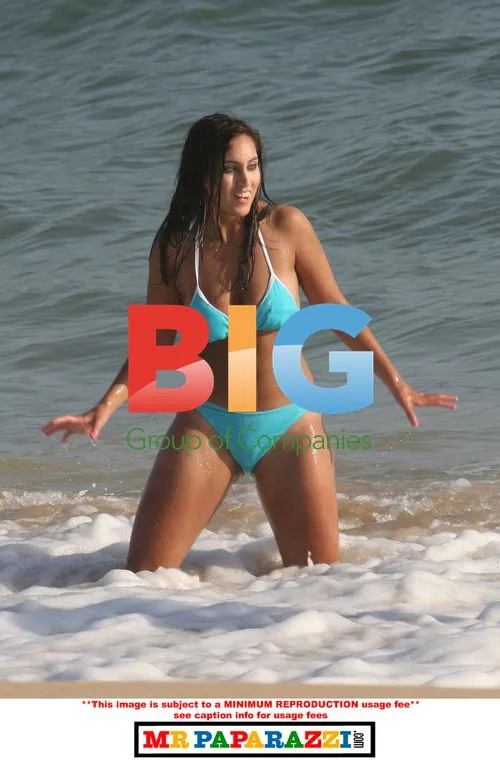 Big Brother Contestant on Beach