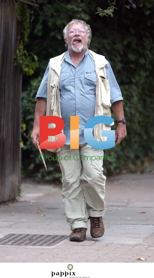 Bill Oddie carries plastic deer