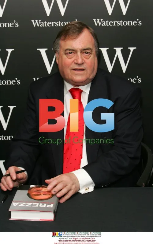 Former UK deputy PM signs memoirs