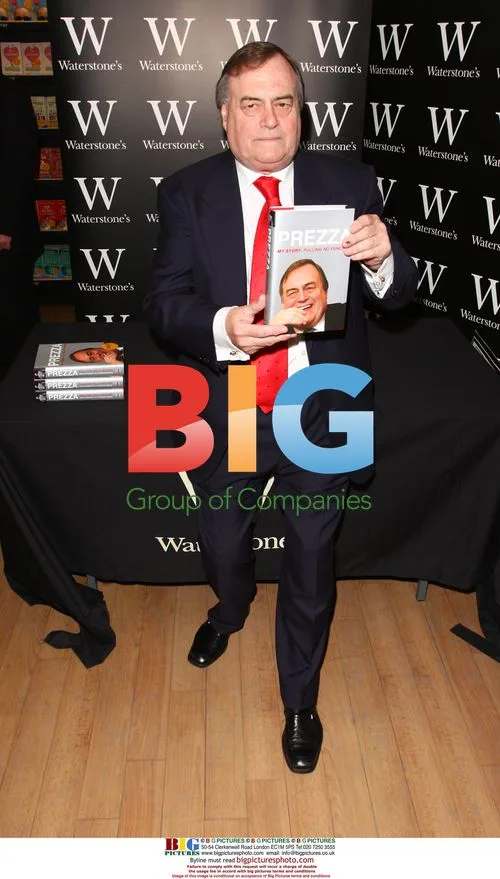 Former deputy PM signs memoir copies